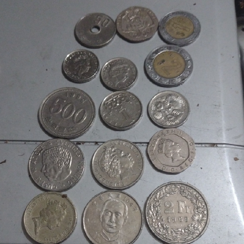 Diverse Coin Collection with Silver (.63 Oz)